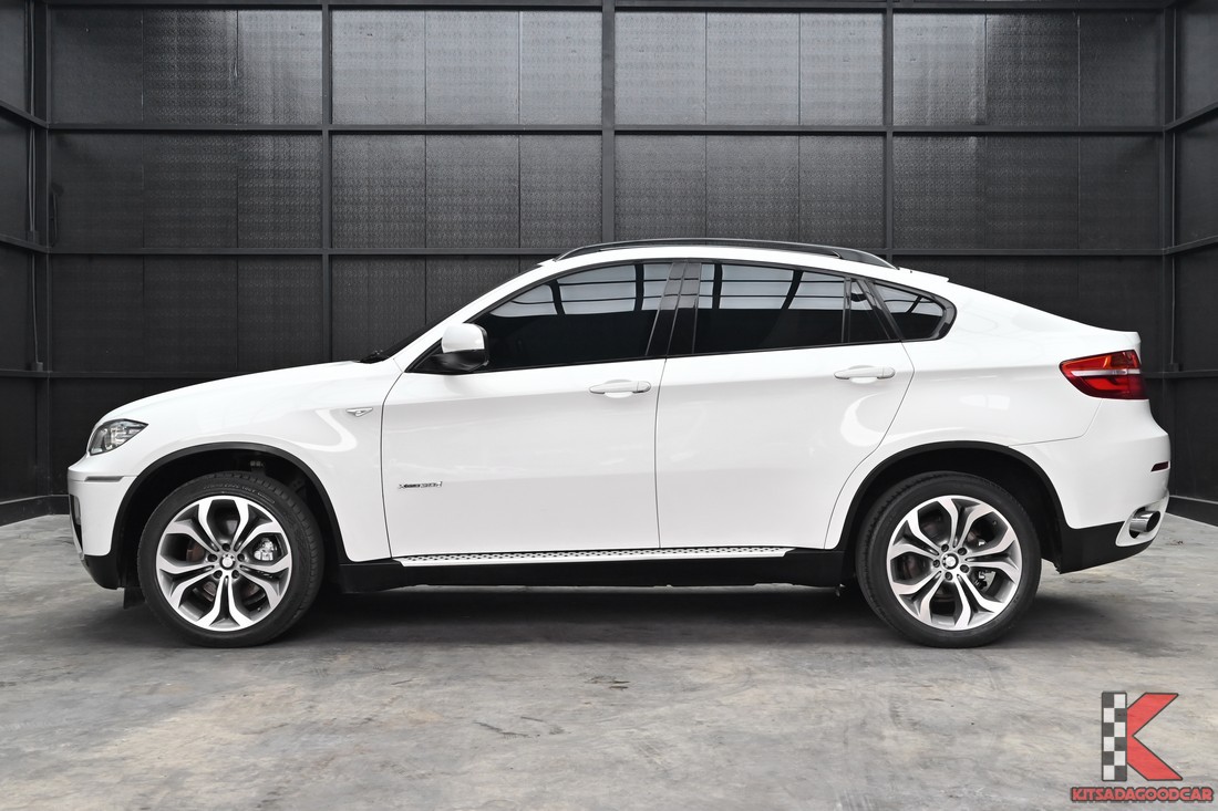 BMW X6 3.0 E71 xDrive30d ปี 2014 ด้านข้างตัวรถสีขาว
